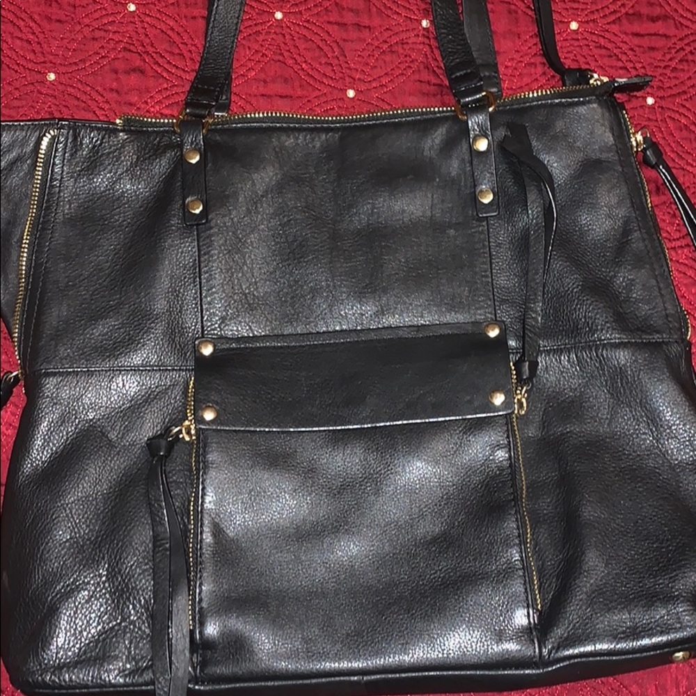 A black Kooba purse.